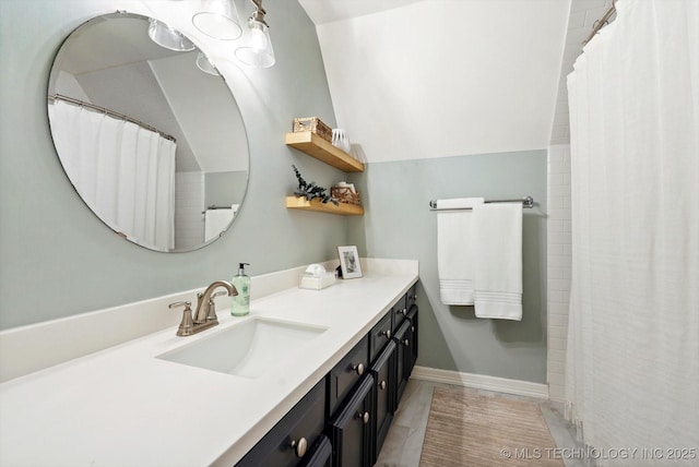 3606 E 70th Pl, Tulsa, OK 74136 - bathroom featuring vanity and a shower with curtain
