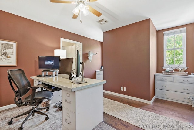 3606 E 70th Pl, Tulsa, OK 74136 - home office with wood finished floors, baseboards, and a ceiling fan