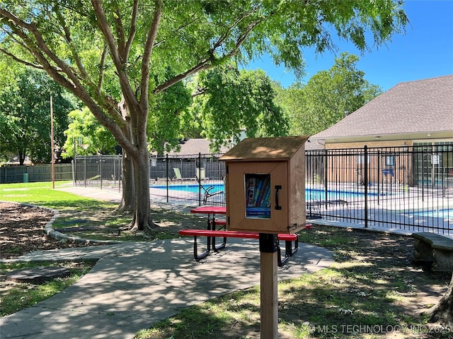3606 E 70th Pl, Tulsa, OK 74136 - view of property's community featuring a swimming pool