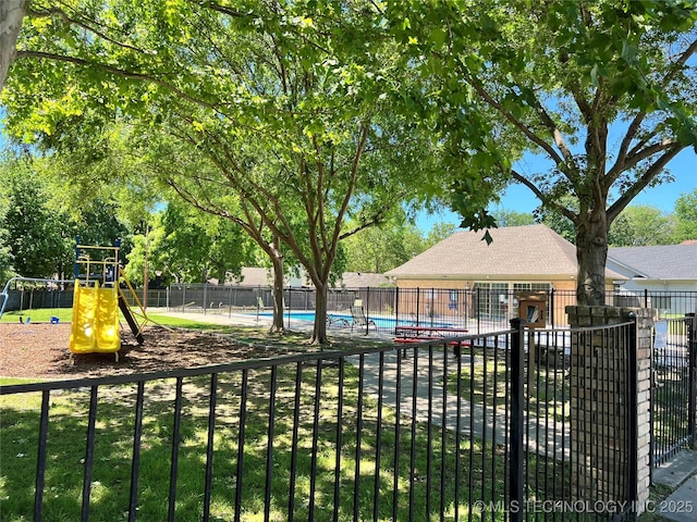 3606 E 70th Pl, Tulsa, OK 74136 - view of yard with a community pool