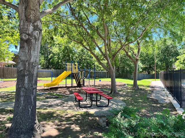 3606 E 70th Pl, Tulsa, OK 74136 - view of playground with a fenced backyard