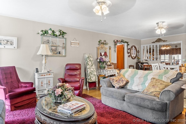 819 W Elm St, Durant, OK 74701 - living room with ceiling fan, wood finished floors, and crown molding