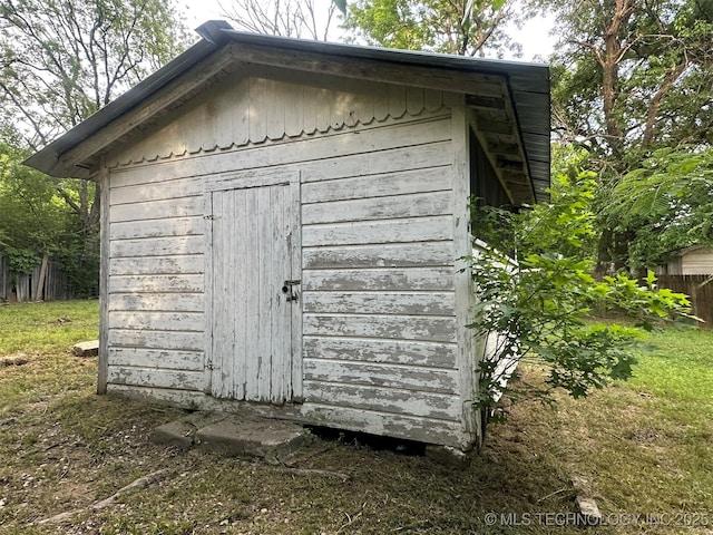 709 W Durant, Wilburton, OK 74578 - view of shed featuring fence