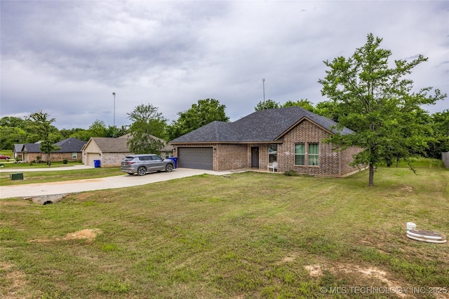 71 Rebel Ln, Durant, OK 74701 - view of front of house with concrete driveway, an attached garage, brick siding, and a front lawn