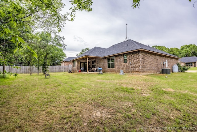 71 Rebel Ln, Durant, OK 74701 - back of house featuring brick siding