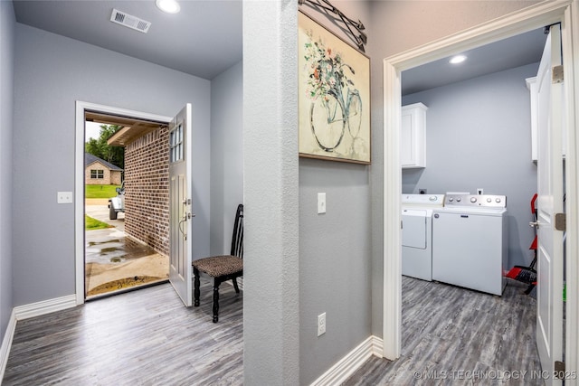 71 Rebel Ln, Durant, OK 74701 - washroom featuring separate washer and dryer, cabinet space, wood finished floors, baseboards, and recessed lighting
