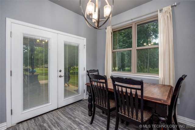 71 Rebel Ln, Durant, OK 74701 - dining area with french doors, a chandelier, wood finished floors, and baseboards