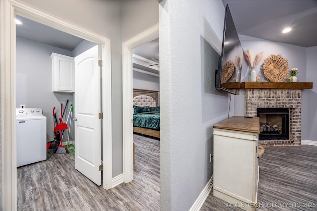 71 Rebel Ln, Durant, OK 74701 - hall with washer / dryer, wood finished floors, baseboards, and recessed lighting