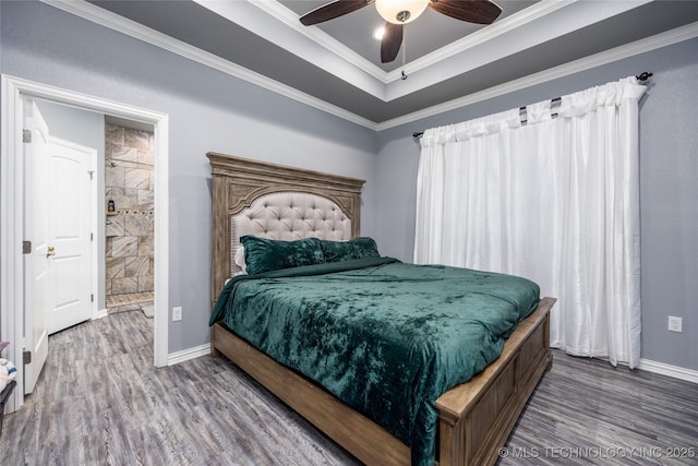 71 Rebel Ln, Durant, OK 74701 - bedroom with wood finished floors, baseboards, ornamental molding, and a ceiling fan