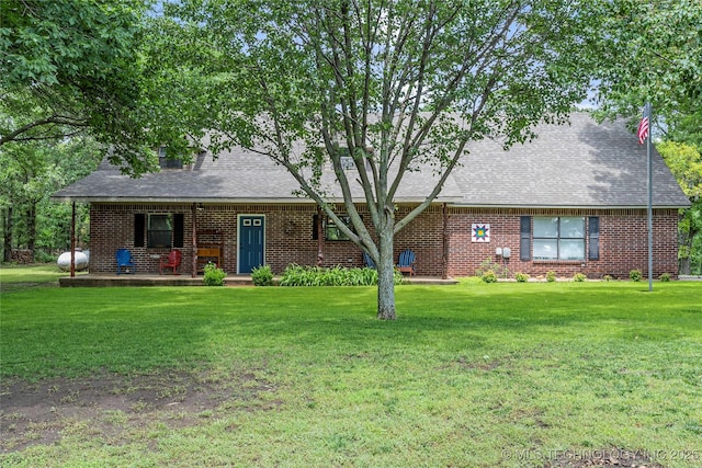 10797 S Talala Creek Ct # B, Talala, OK 74080 - view of front facade featuring a front lawn, brick siding, and a shingled roof