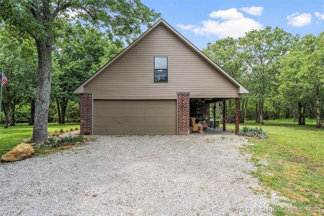 10797 S Talala Creek Ct # B, Talala, OK 74080 - view of home's exterior featuring an outbuilding, a yard, a garage, and brick siding
