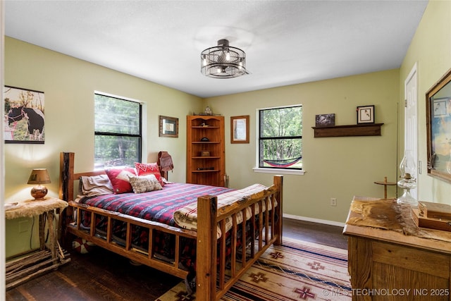 10797 S Talala Creek Ct # B, Talala, OK 74080 - bedroom with wood finished floors and baseboards