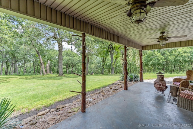 10797 S Talala Creek Ct # B, Talala, OK 74080 - view of patio with a ceiling fan and view of wooded area