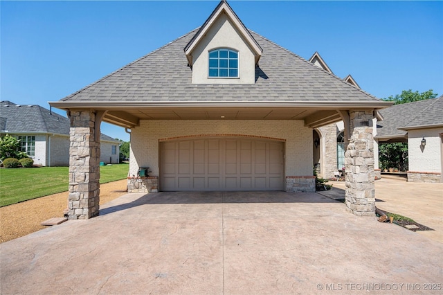 12432 Boulder Rdg, Sperry, OK 74073 - view of front of house with a shingled roof, brick siding, and driveway