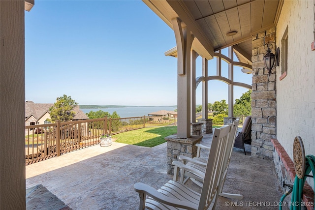 12432 Boulder Rdg, Sperry, OK 74073 - view of patio / terrace with a water view