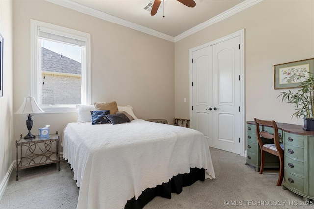 12432 Boulder Rdg, Sperry, OK 74073 - bedroom featuring light colored carpet, crown molding, a closet, and ceiling fan