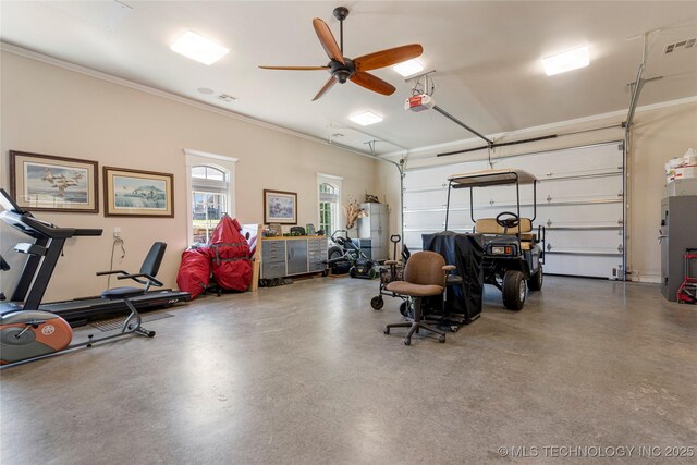 12432 Boulder Rdg, Sperry, OK 74073 - garage with a ceiling fan and a garage door opener