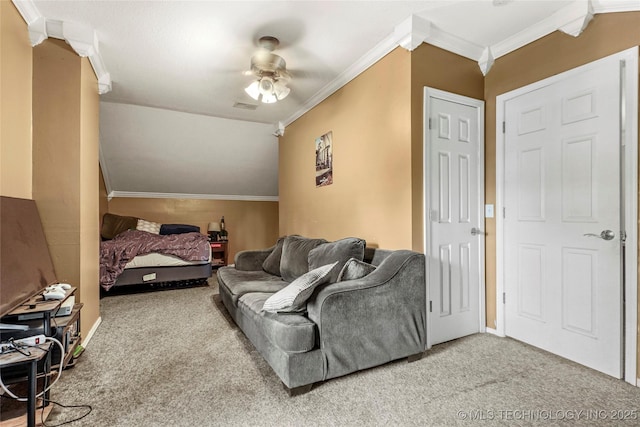 living area featuring carpet floors, ceiling fan, ornamental molding, and baseboards