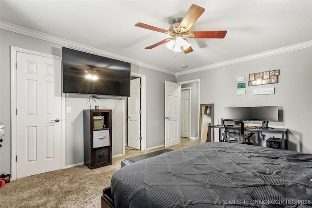 bedroom with ornamental molding, baseboards, carpet, and ceiling fan