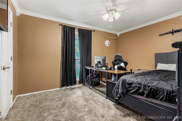 bedroom featuring ornamental molding, carpet flooring, an office area, and baseboards