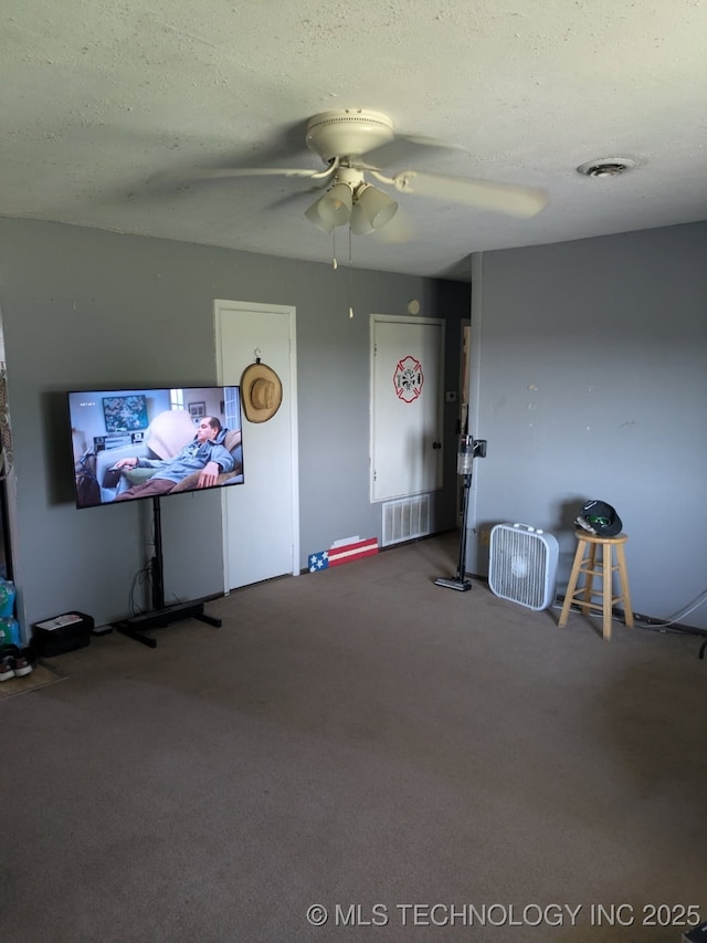 115 W Lisa Ln, Big Cabin, OK 74332 - unfurnished living room featuring ceiling fan, carpet floors, and a textured ceiling
