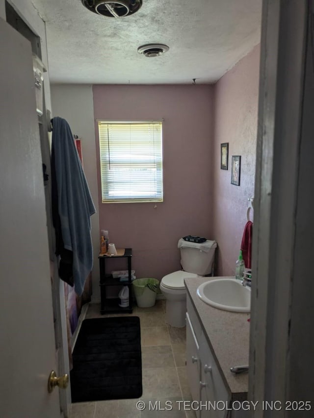 115 W Lisa Ln, Big Cabin, OK 74332 - bathroom featuring vanity, a textured ceiling, and tile patterned floors