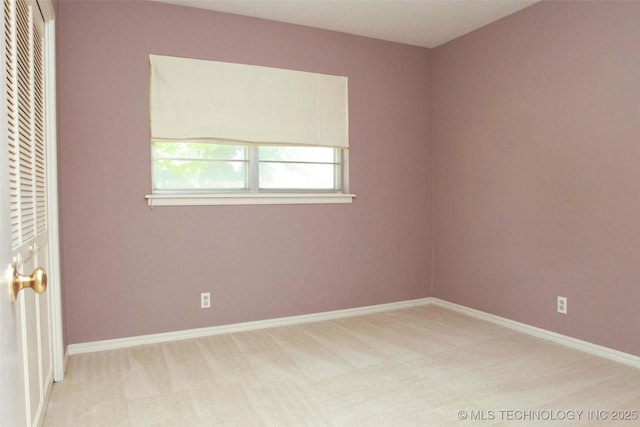 4507 S Irvington Ave, Tulsa, OK 74135 - unfurnished bedroom with light carpet and baseboards