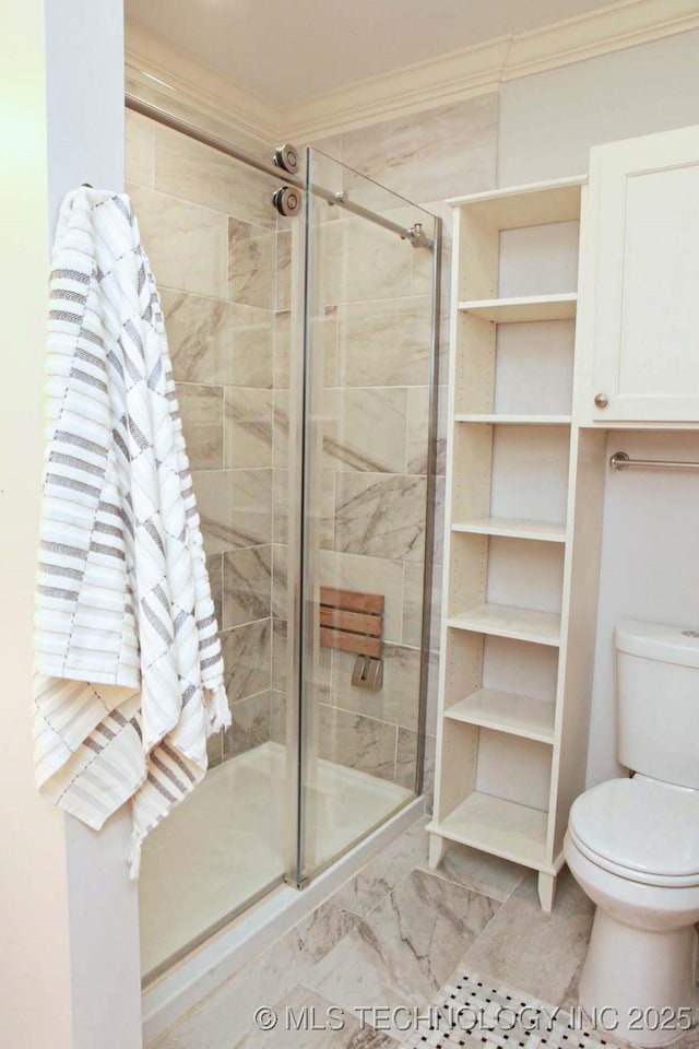 4507 S Irvington Ave, Tulsa, OK 74135 - bathroom with ornamental molding, a stall shower, toilet, and marble finish floors