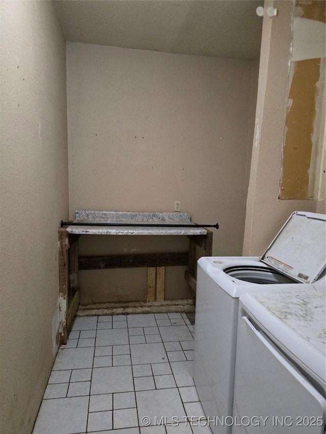 309 Hillcrest St, Pawnee, OK 74058 - washroom featuring separate washer and dryer and light tile patterned floors