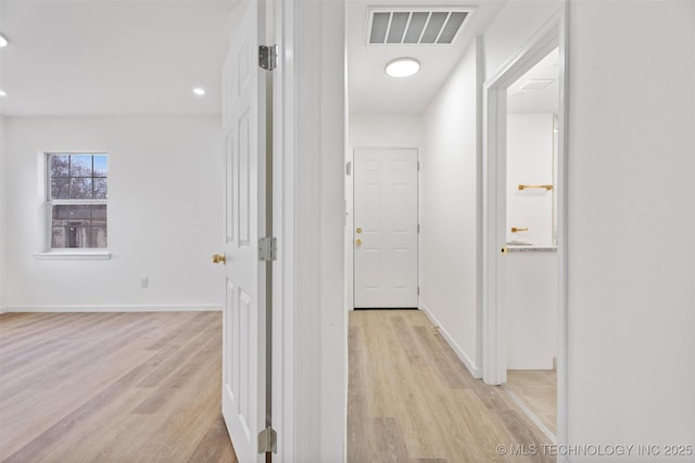 3919 E Archer St, Tulsa, OK 74115 - hall featuring light wood-style floors and recessed lighting