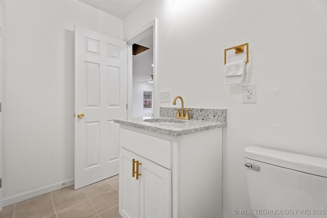 3919 E Archer St, Tulsa, OK 74115 - bathroom featuring vanity and tile patterned floors