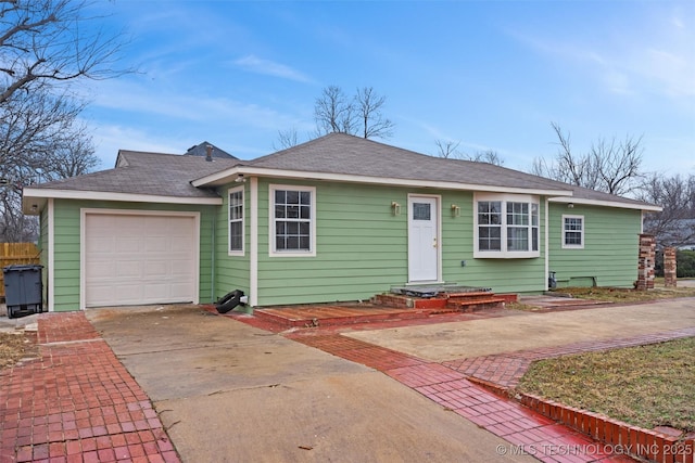 3919 E Archer St, Tulsa, OK 74115 - ranch-style house featuring driveway and a garage