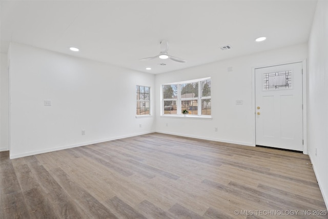3919 E Archer St, Tulsa, OK 74115 - empty room featuring wood finished floors, a ceiling fan, and recessed lighting