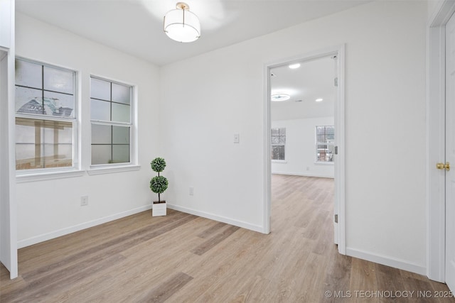 3919 E Archer St, Tulsa, OK 74115 - spare room with light wood-type flooring and baseboards