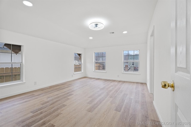 3919 E Archer St, Tulsa, OK 74115 - unfurnished room featuring light wood-style flooring and recessed lighting