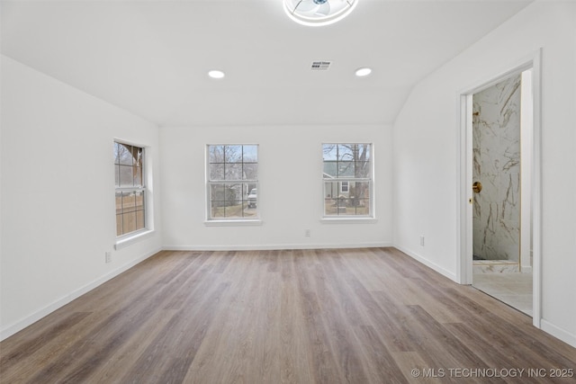3919 E Archer St, Tulsa, OK 74115 - spare room featuring wood finished floors and recessed lighting