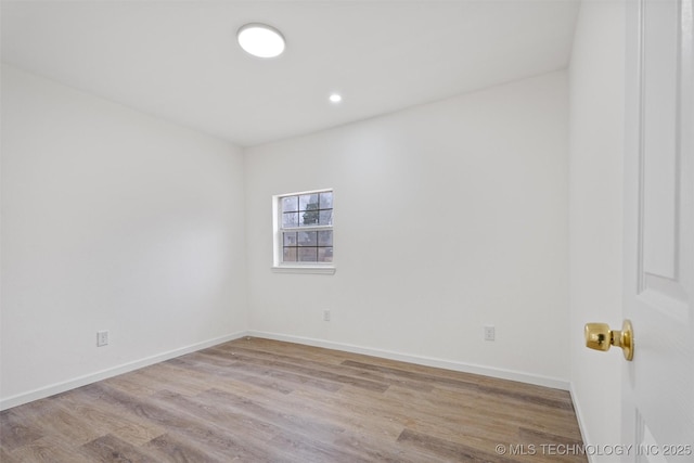 3919 E Archer St, Tulsa, OK 74115 - unfurnished room with wood finished floors and recessed lighting