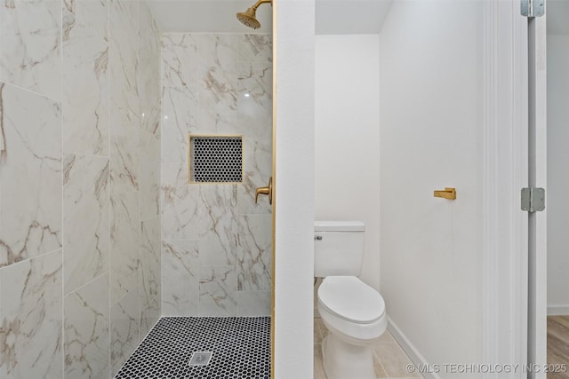 3919 E Archer St, Tulsa, OK 74115 - bathroom featuring a tile shower and toilet