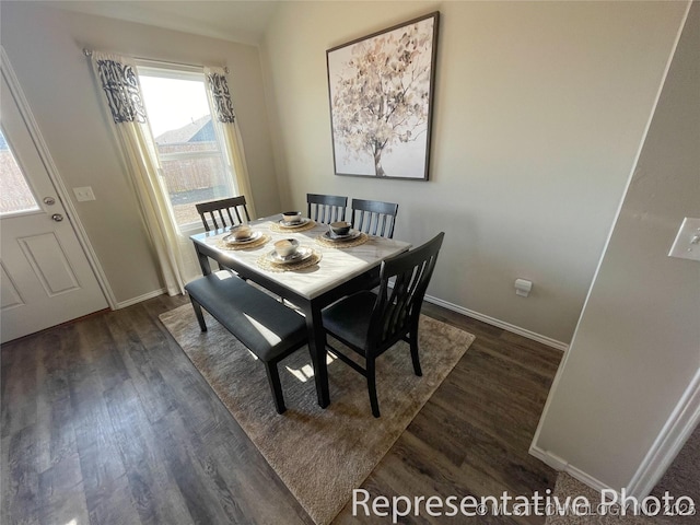 11806 S 274th Ave E, Coweta, OK 74429 - dining area with dark wood-type flooring and baseboards
