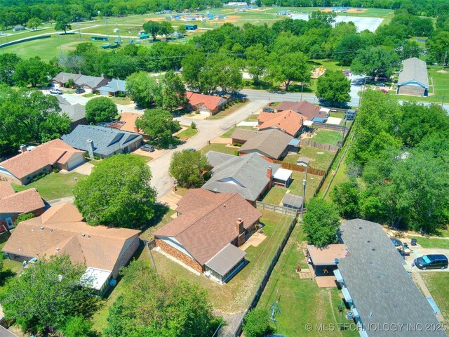 124 Canterbury Ct, Bartlesville, OK 74006 - aerial view of property and surrounding area with nearby suburban area