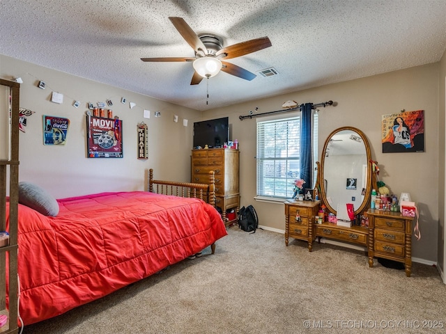 124 Canterbury Ct, Bartlesville, OK 74006 - bedroom with carpet, a textured ceiling, ceiling fan, and baseboards