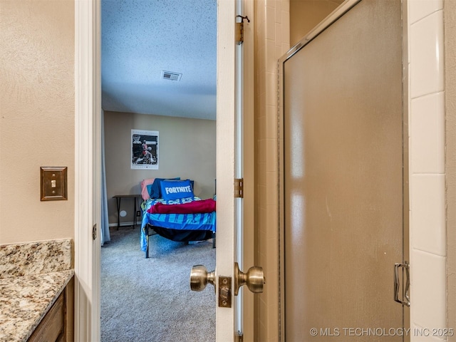 124 Canterbury Ct, Bartlesville, OK 74006 - corridor with carpet