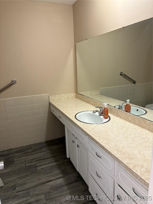 823 Sooner Park Dr, Bartlesville, OK 74006 - bathroom featuring vanity and wood finished floors