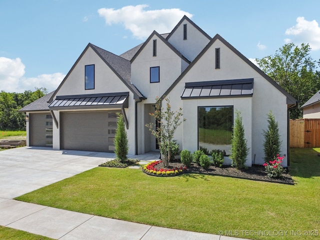 682 W 113th Ct S, Jenks, OK 74037 - view of front facade featuring a standing seam roof, driveway, and stucco siding