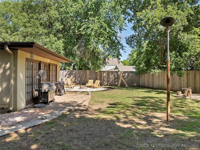 532 Hammers Rd, Ardmore, OK 73401 - fenced backyard featuring a patio area