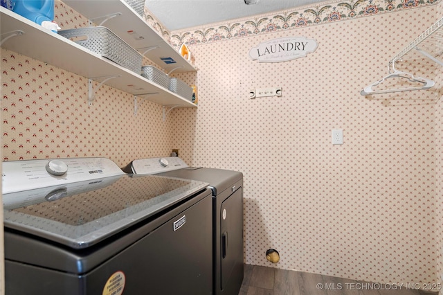 532 Hammers Rd, Ardmore, OK 73401 - laundry room with separate washer and dryer and wood finished floors