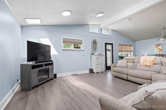 532 Hammers Rd, Ardmore, OK 73401 - living area with wood finished floors, ceiling fan, plenty of natural light, and baseboards