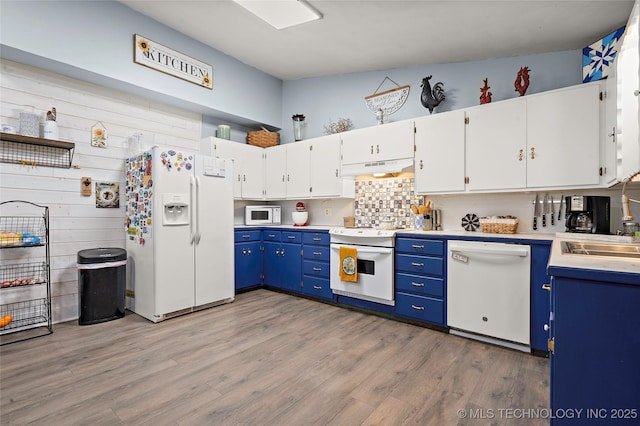 532 Hammers Rd, Ardmore, OK 73401 - kitchen featuring white appliances, blue cabinets, light wood-style flooring, white cabinets, and light countertops