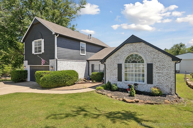 27108 E 82nd St S, Broken Arrow, OK 74014 - view of front facade featuring a garage, concrete driveway, a front lawn, stone siding, and brick siding