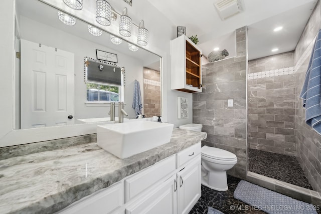 27108 E 82nd St S, Broken Arrow, OK 74014 - bathroom with vanity, toilet, and a walk in shower